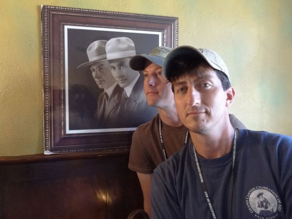 Dave Santillanes and Dan Schultz posing with the Kolb Brothers photo at Kolb Studio in Grand Canyon National Park.