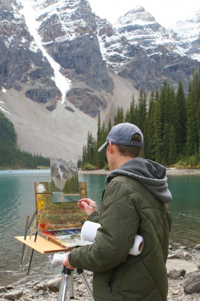 Dan Schultz Painting at Moraine Lake in Banff National Park, Canada