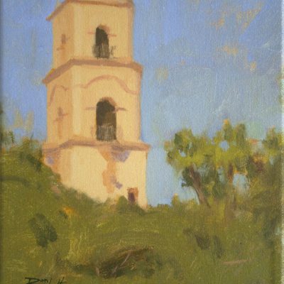 Ojai Icon, giclee print by Dan Schultz. Spanish-style Ojai tower rises above green trees under a blue sky.