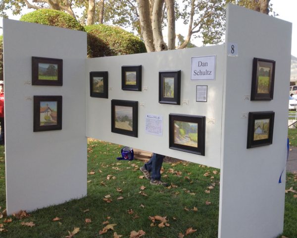 Dan Schultz's booth in Sonoma Plaza during Sonoma Plein Air 2012.