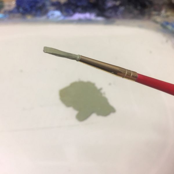 #2 round brush used for signing a dry painting.