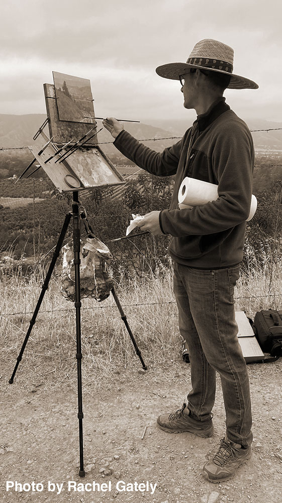 Dan Schultz painting outdoors overlooking Ojai, California